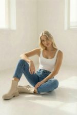 White Bodysuit Sitting Pose