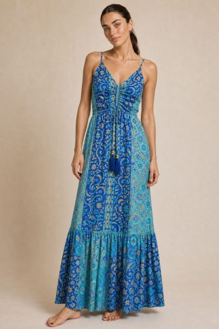 Anvi ART SILK Maxi Φόρεμα in blue and gold  Χαρακτηριστικά Προϊόντος • Υλικό: 100% Art Silk • Υφή: Ανάλαφρη, αέρινη και δροσερή • Γραμμή: Maxi με χαλαρή εφαρμογή • Σχέδιο: Εντυπωσιακό μπλε εμπριμέ print • Μπούστο: Σούρες στο κέντρο με decorative φουντάκια • Τιράντες: Λεπτές και ρυθμιζόμενες • Εφαρμογή: Άνετη και θηλυκή • Ιδιότητα: Non Iron  Διαστάσεις (One Size) • Στήθος: έως 96 cm • Μέση: έως 98 cm • Περιφέρεια: έως 145 cm  Οδηγίες Φροντίδας • Πλύσιμο στο χέρι ή στους 30°C • Χωρίς στύψιμο • Δεν απαιτεί σιδέρωμα (non iron)